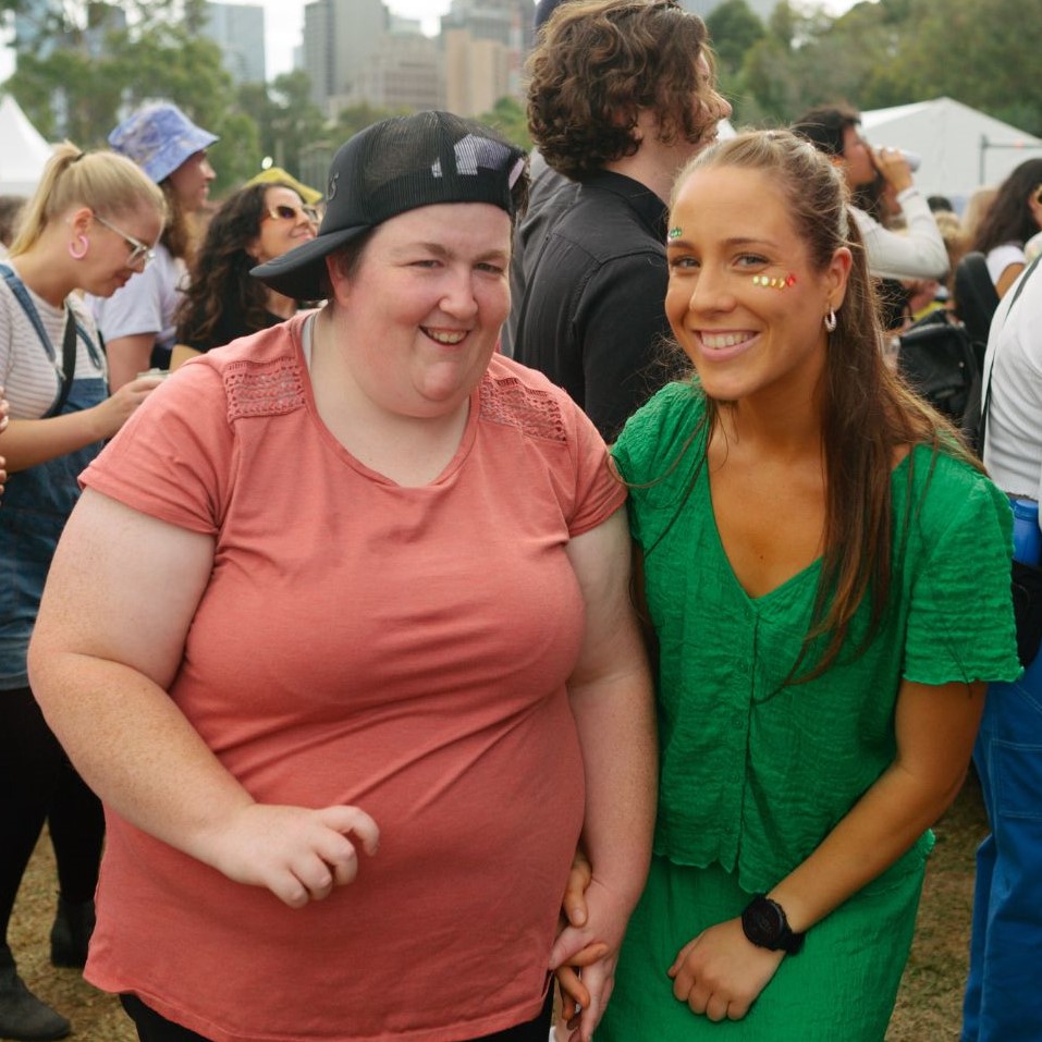 Support worker and participant smiling