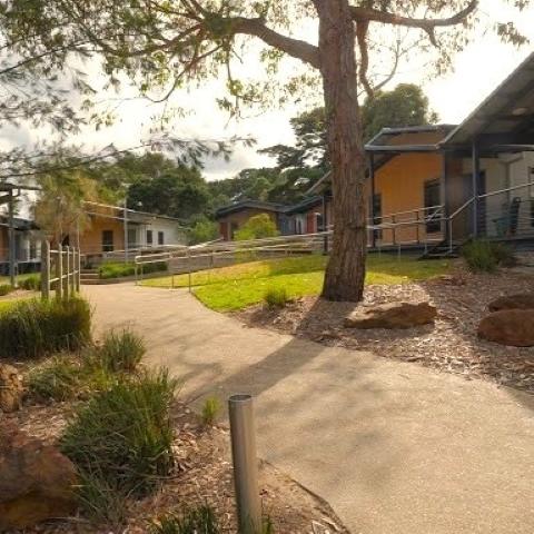 Sunny walkway through buildings at Camp Manyung