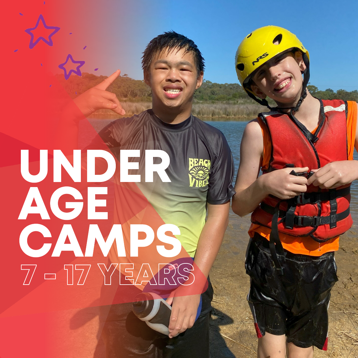 2 campers smiling in their canoeing gear